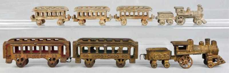 Appraisal: Cast Iron Train Sets American Both include a steam-type engine