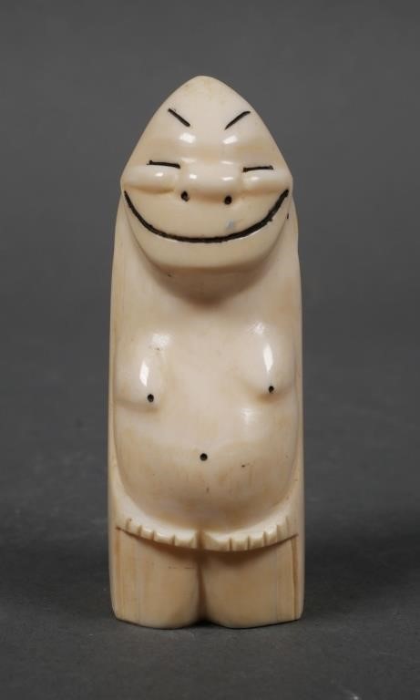 Appraisal: Vintage Alaskan or Inuit carved walrus tusk billikin figure Measures