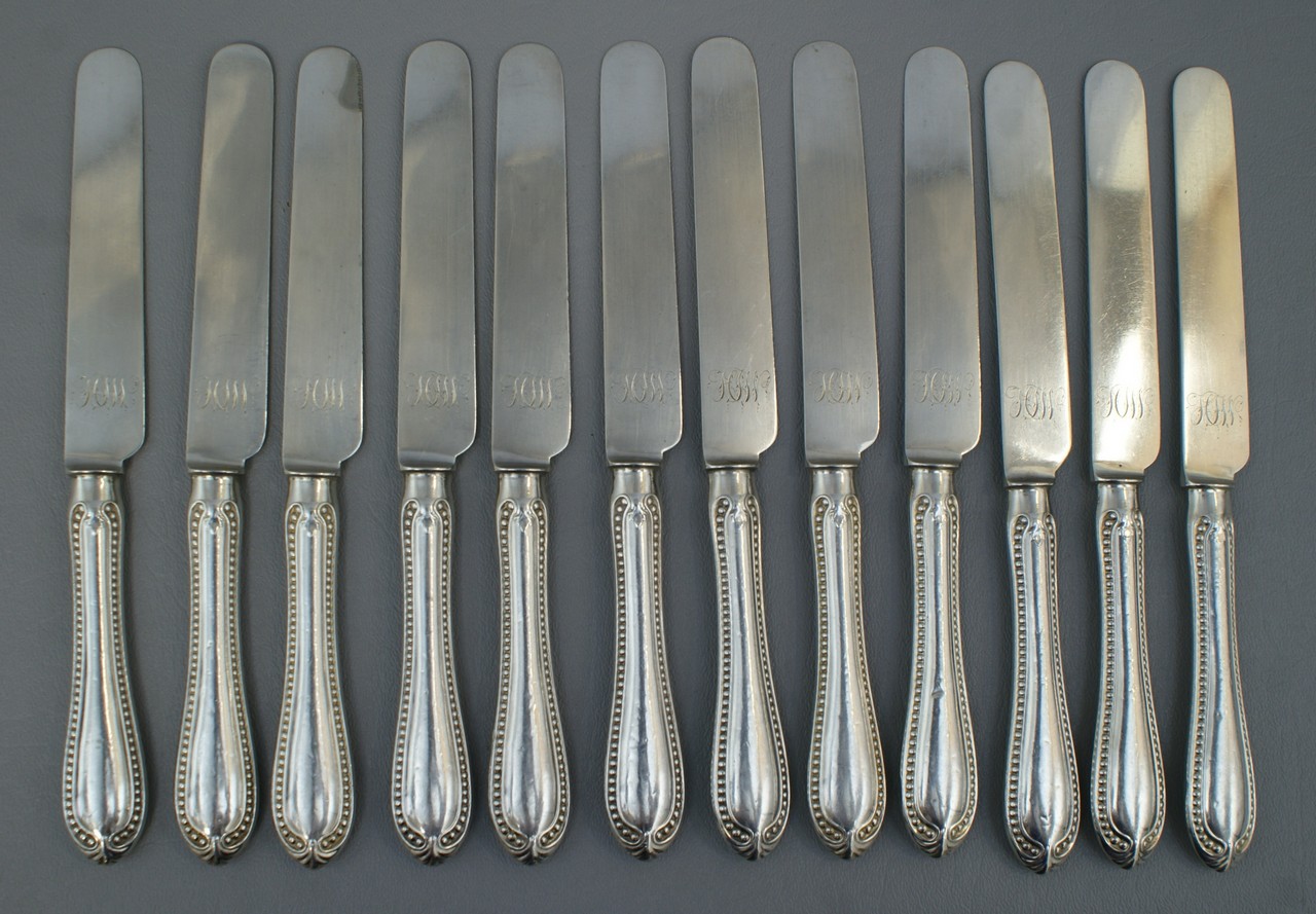 Appraisal: JE Caldwell silver luncheon knives solid blades hollow handles long