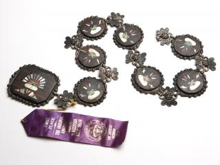 Appraisal: A Zuni silver belt With seven round figural medallions each