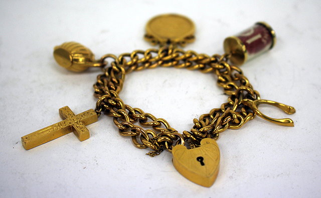 Appraisal: A -CARAT GOLD CHARM BRACELET together with a number of