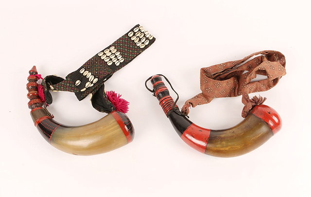 Appraisal: TWO BURMESE SHAN KREN HORNS with painted decoration and cowry