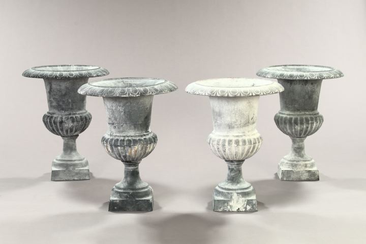 Appraisal: Set of Four Neoclassical-Style Cast-Iron Garden Urns of campana form