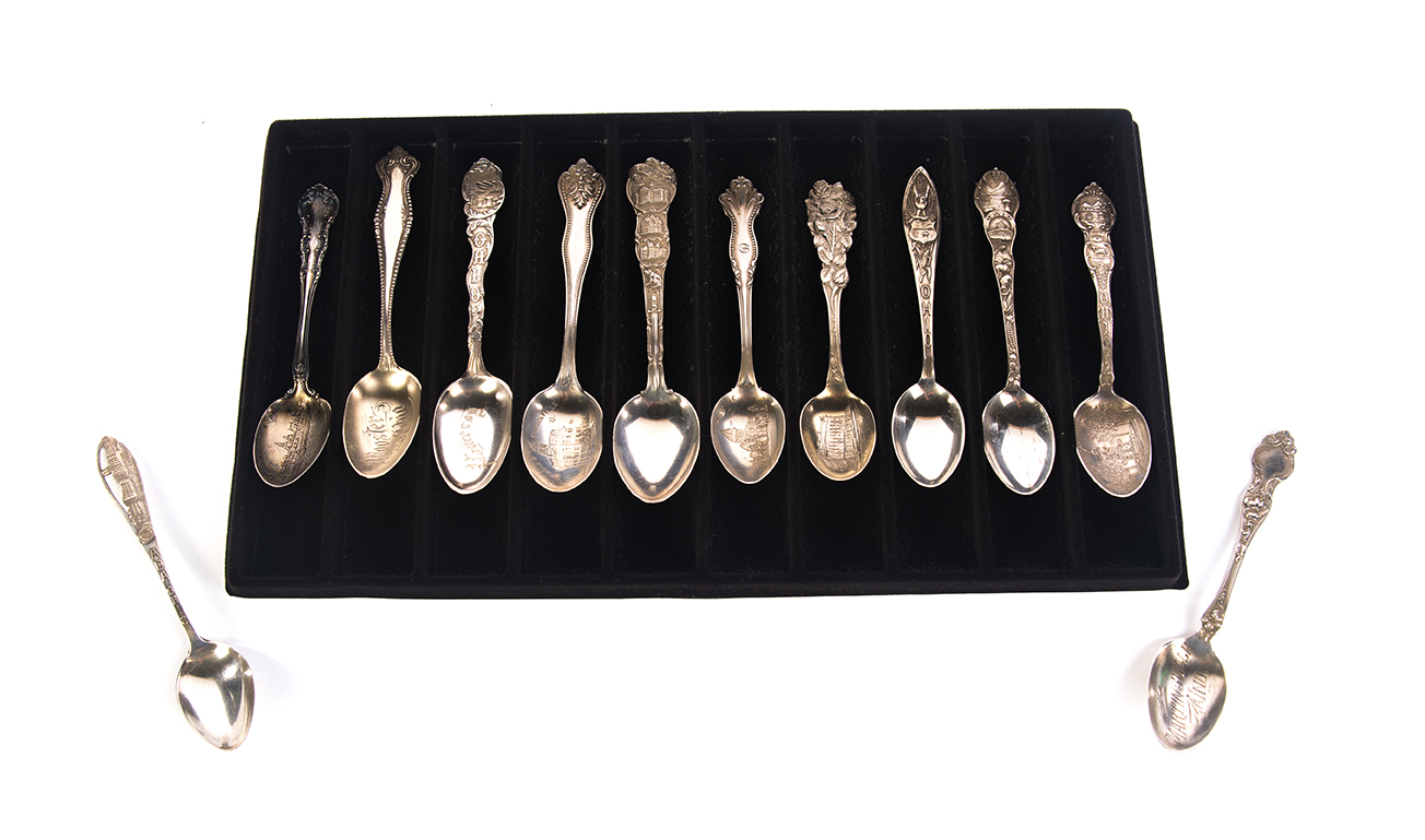 Appraisal: TWELVE STERLING SILVER SOUVENIR SPOONS American th century Scenes includes