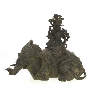 Appraisal: Chinese bronze seated Guanyin and elephant group Chinese bronze seated