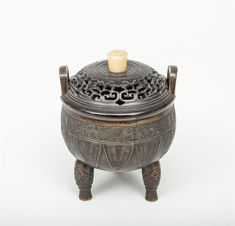 Appraisal: Chinese Archaic Style Bronze Tripod Censer The pierced hardwood cover