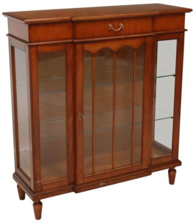 Appraisal: Italian walnut vitrine display cabinet th c having shaped top