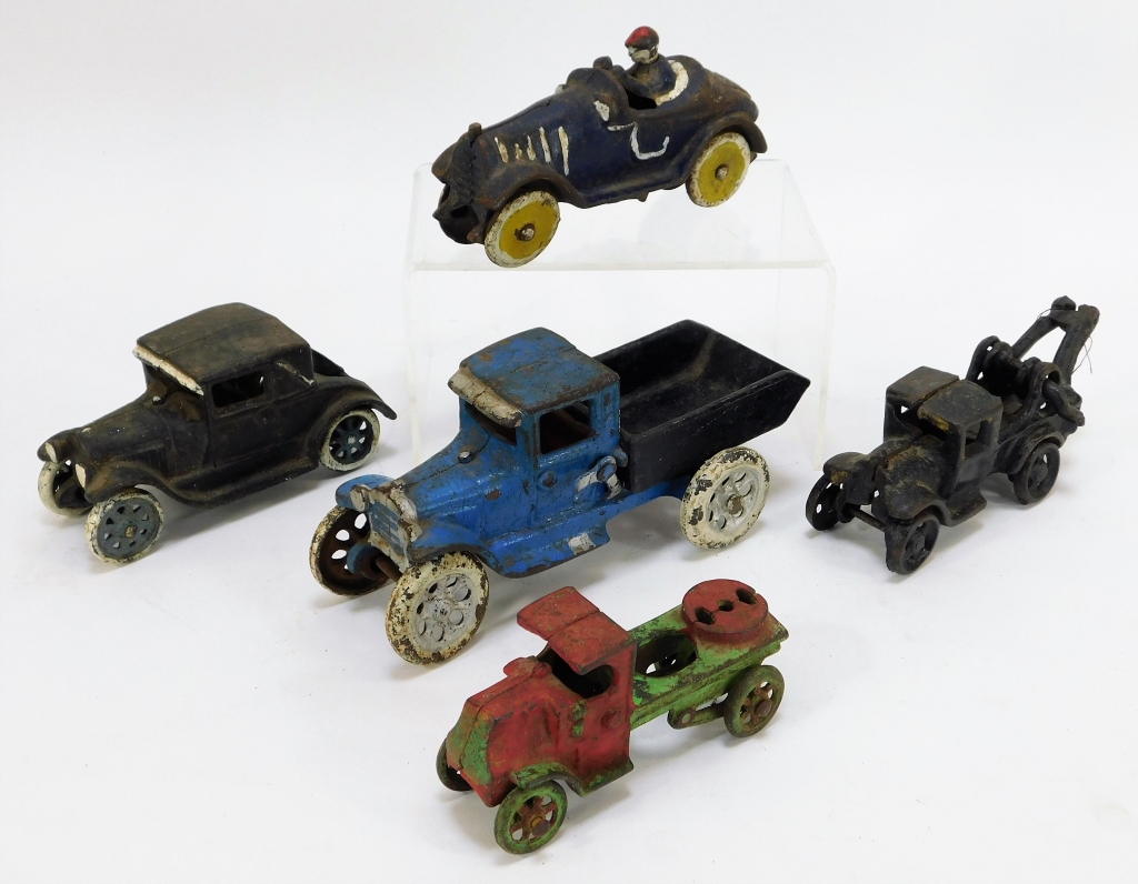 Appraisal: PC ANTIQUE CAST IRON TOY CAR TRUCK GROUP United States