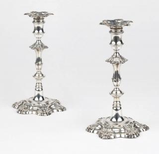 Appraisal: A pair of George II sterling silver candlesticks London with