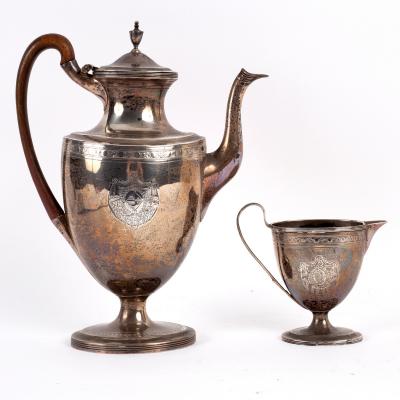 Appraisal: A George III vase shaped silver coffee pot and milk