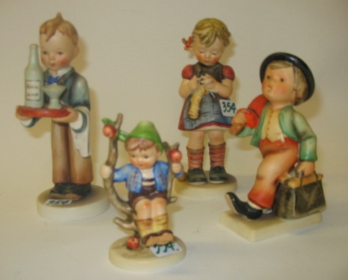 Appraisal: A COLLECTION OF FOUR GERMAN HUMMEL FIGURES Walter HUM TM-