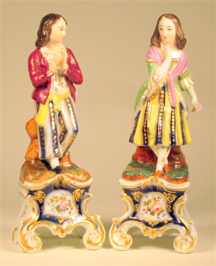 Appraisal: Pair of Paris porcelain figures of a youth and a