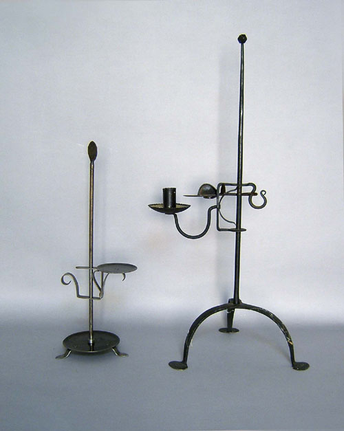 Appraisal: Two contemporary wrought iron table top candlestands Provenance Collection of