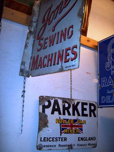 Appraisal: A SEWING MACHINES JONES ENAMEL SIGN AND A PARKER ENAMEL