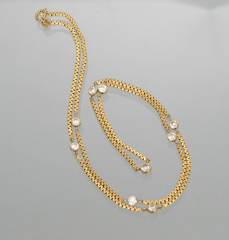 Appraisal: A Yellow Gold Chain with Diamonds A long k yellow