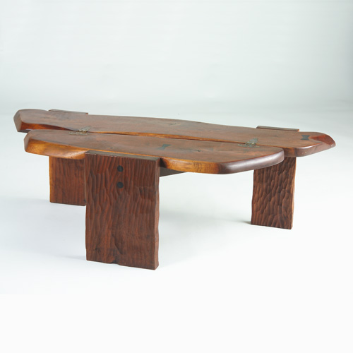 Appraisal: PHILLIP LLOYD POWELL Unusual coffee table with two free-form planks