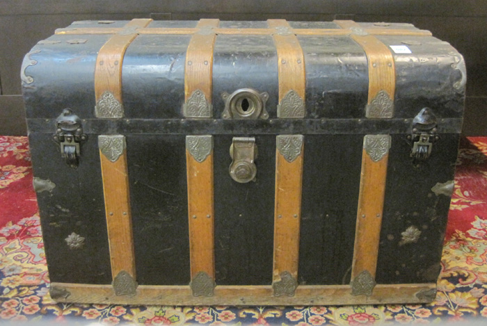 Appraisal: ANTIQUE TRAVEL TRUNK American th century having a flat dome