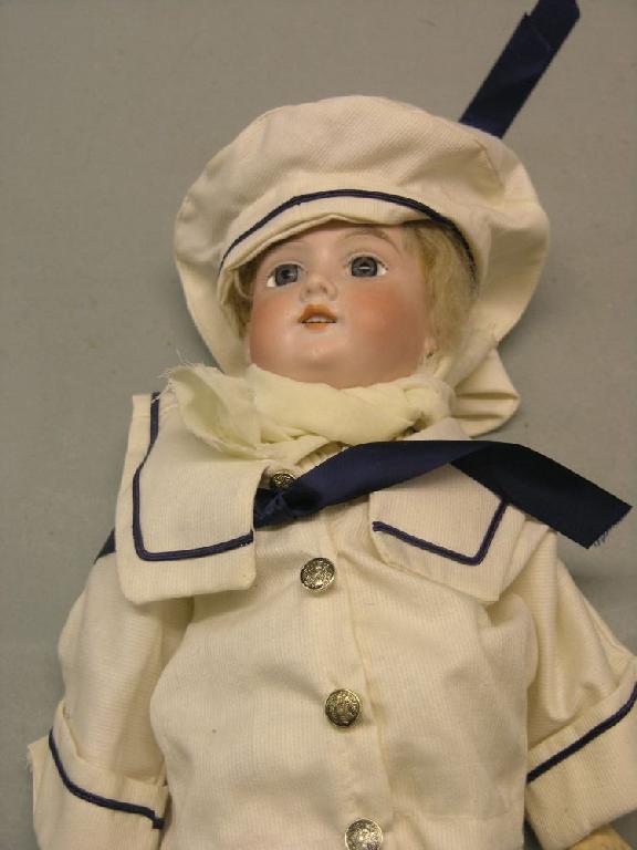 Appraisal: An Armand Marseille bisque boy doll mould with fixed glass