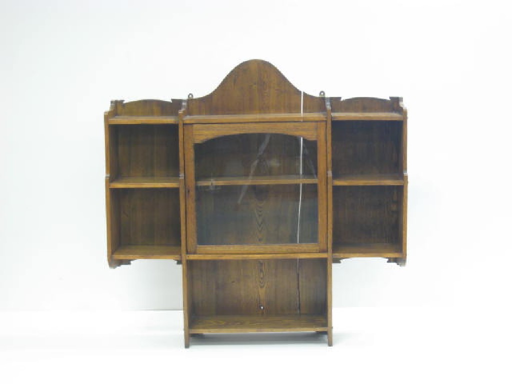 Appraisal: A set of Arts Crafts Liberty oak Wall Shelves with