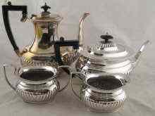 Appraisal: A four piece half fluted silver plated tea set circa