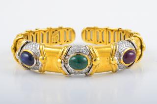 Appraisal: Gem Stone Diamond Gold Bangle Gold cab ruby emerald sapphire