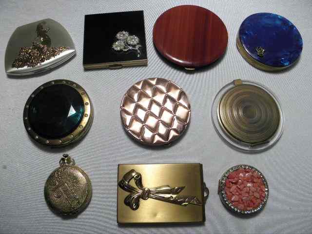 Appraisal: Assorted vintage powder compacts Includes pieces Brands such as Elgin