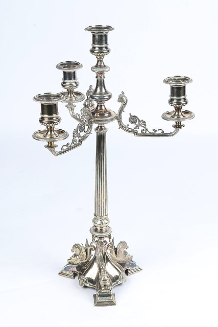 Appraisal: A THREE BRANCH FOUR LIGHT SILVER PLATED CANDELABRA with fluted