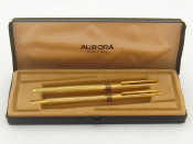 Appraisal: Aurora A set comprising an Aurora gold-plated godron fountain pen