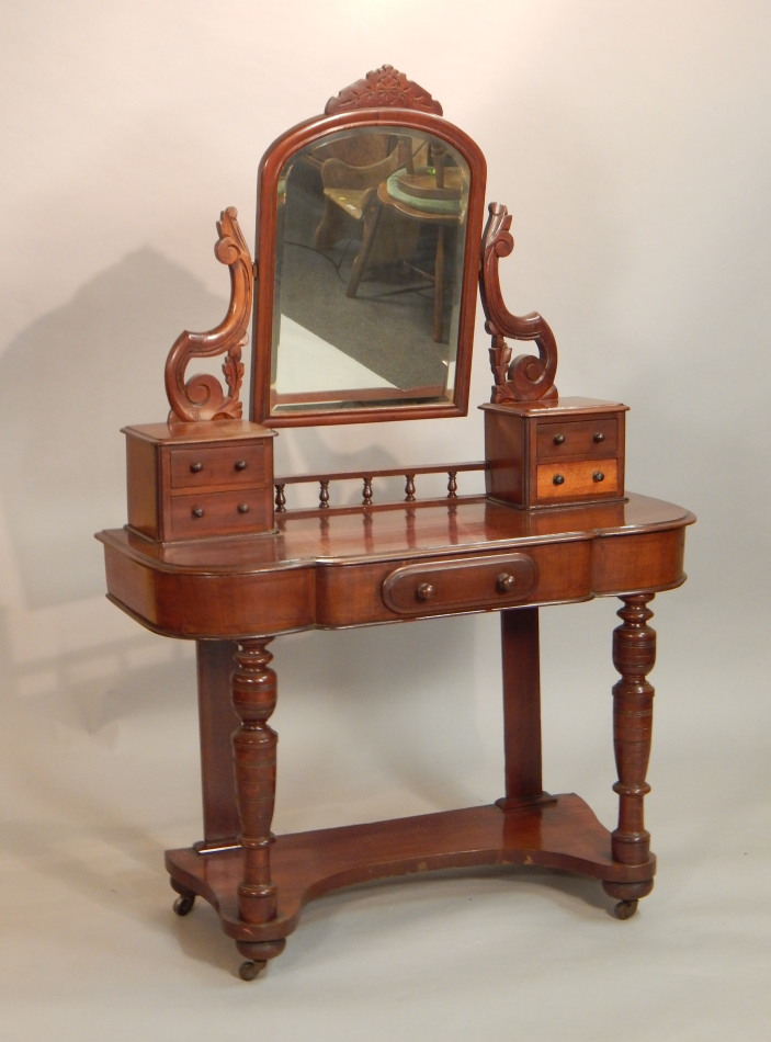 Appraisal: A thC Victorian mahogany Duchess type dressing table the arched