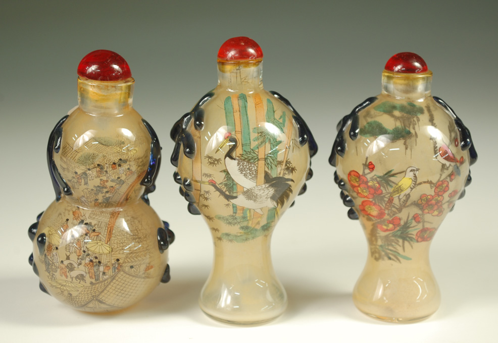 Appraisal: SET OF THREE CHINESE REVERSE PAINTED GLASS SNUFF BOTTLES each