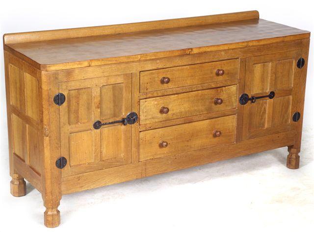 Appraisal: ROBERT MOUSEMAN THOMPSON OAK SIDEBOARD MID th CENTURY the rectangular