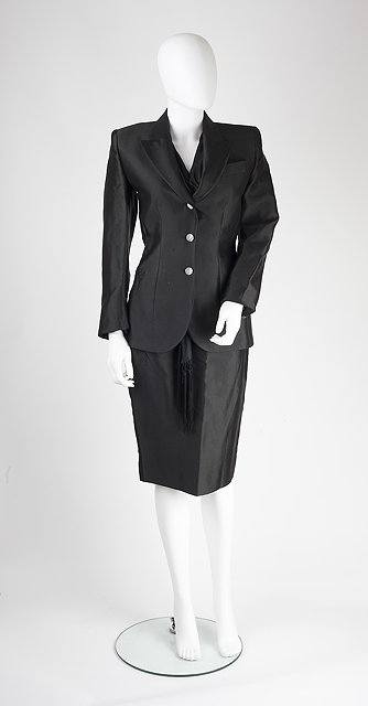 Appraisal: An Alexander McQueen black skirt suit collared jacket with sheer