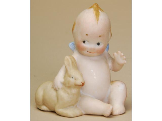 Appraisal: Rose O'Neill Kewpie with Rabbit Germany ca all bisque action