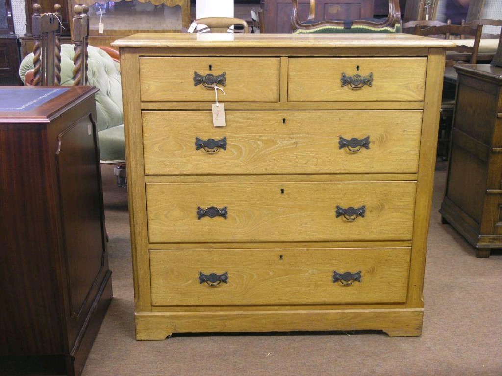 Appraisal: A late Victorian light ash bedroom chest two short and