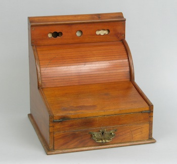 Appraisal: A Patent-Action Roll Top Miniature Writing Desk A patent-action roll