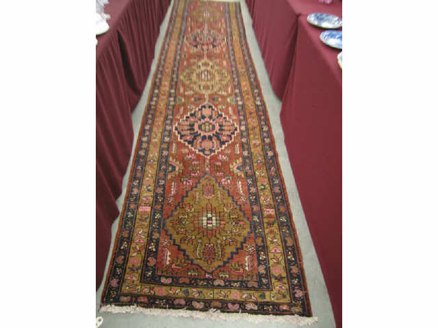 Appraisal: Heriz Persian Handmade Runner interesting medallions deep earthtones ' x