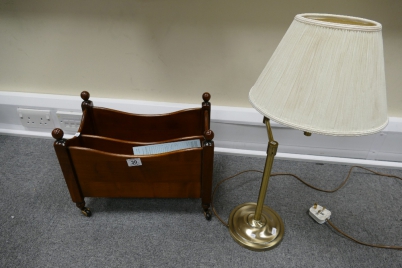 Appraisal: Reproduction magazine rack on casters and adjustable reading lamp