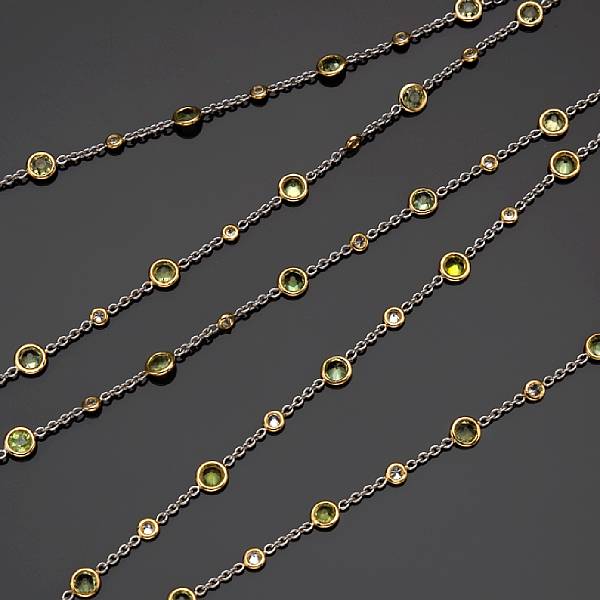 Appraisal: A demantoid garnet and diamond long chain estimated total diamond