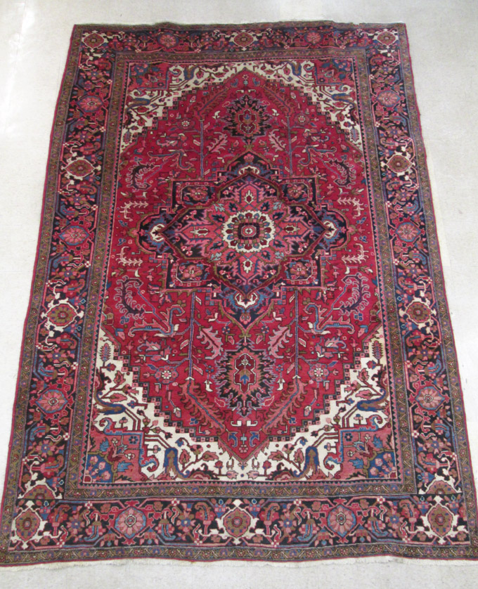 Appraisal: SEMI-ANTIQUE PERSIAN HERIZ CARPET East Azerbaijan Province northwest Iran hand