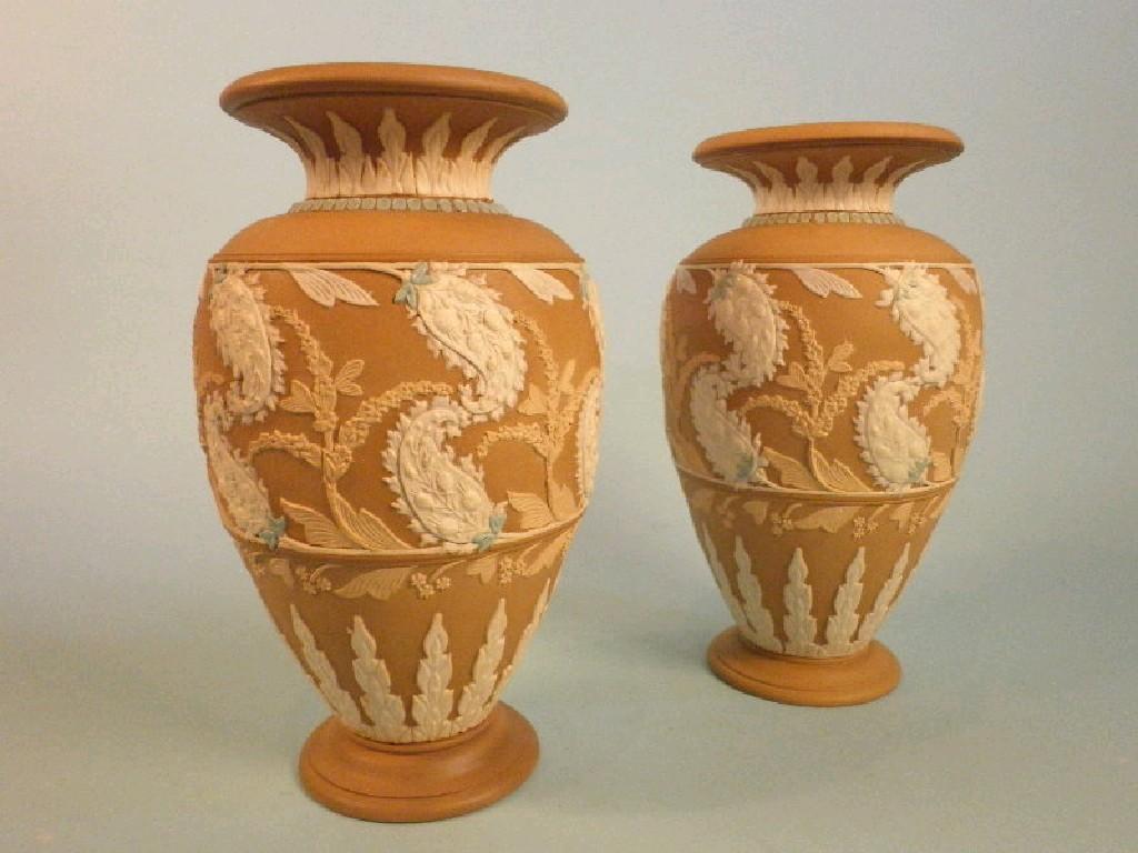 Appraisal: A pair of Doulton Lambeth Silicon ware vases each decorated