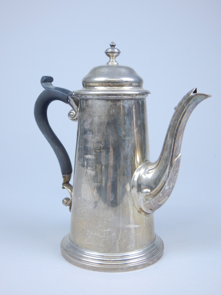 Appraisal: A silver hot water jug with a hinged lid turned