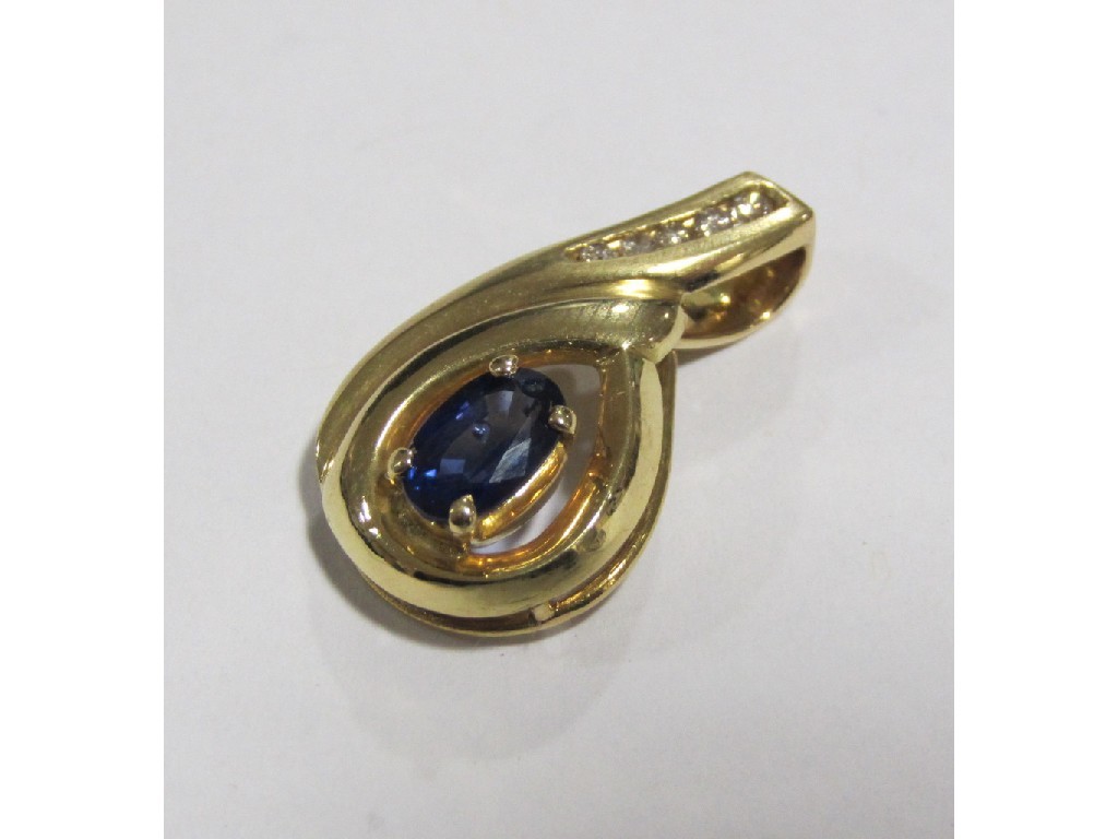 Appraisal: Contemporary ct gold pendant set with oval cut sapphire and