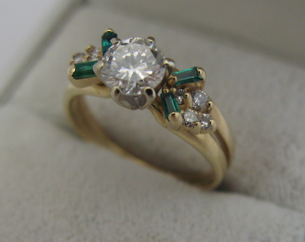 Appraisal: DIAMOND EMERALD AND K GOLD RING WITH APPRAISAL centering a