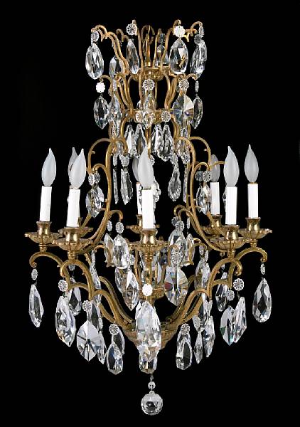 Appraisal: A Rococo style gilt metal and cut glass eight light