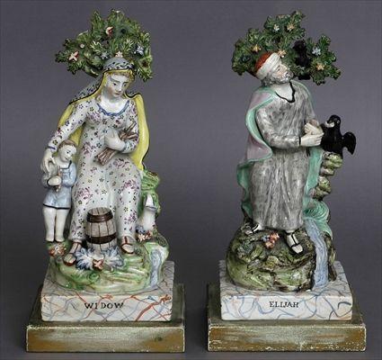 Appraisal: PAIR OF ENGLISH CREAMWARE FIGURES ELIJAH AND WIDOW Now mounted