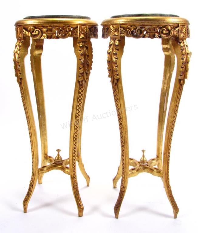 Appraisal: A pair of carved wooden gold gilt finished plant stands