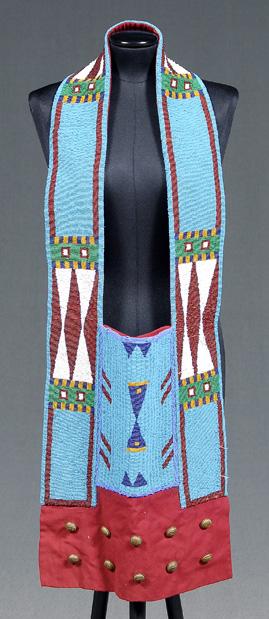 Appraisal: Beaded bandolier bag multi-colored geometric designs on blue field on