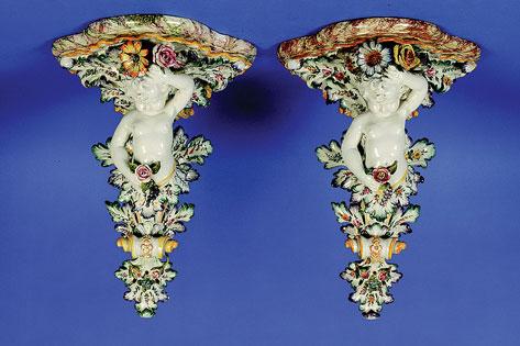 Appraisal: A PAIR OF NOVE FAIENCE WALL BRACKETS of th century