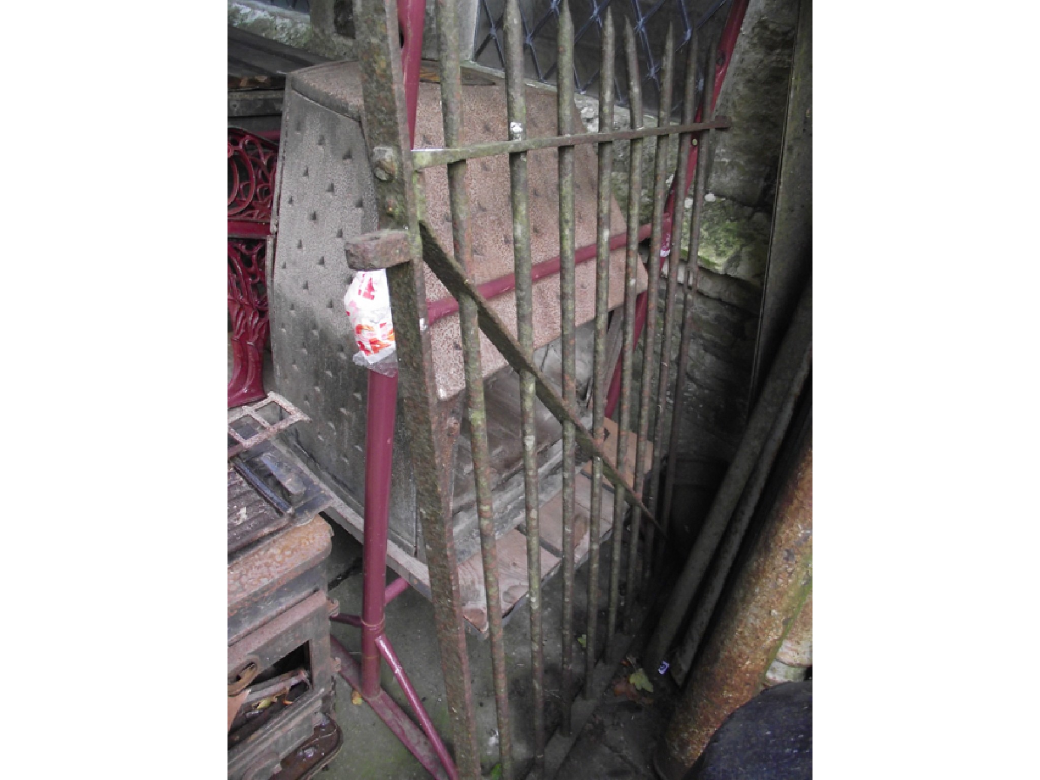 Appraisal: A th century wrought iron pedestrian gate with vertical spiked