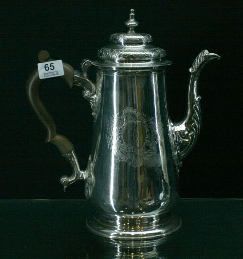 Appraisal: A George II silver coffee pot by James Schruder Newcastle